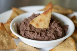 Low in fat and with zero cholesterol, this is one healthy black bean dip. Low in fat and with zero cholesterol, this is one healthy black bean dip.